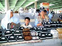 Sellers of scull-caps (Uzbek national head-dress)